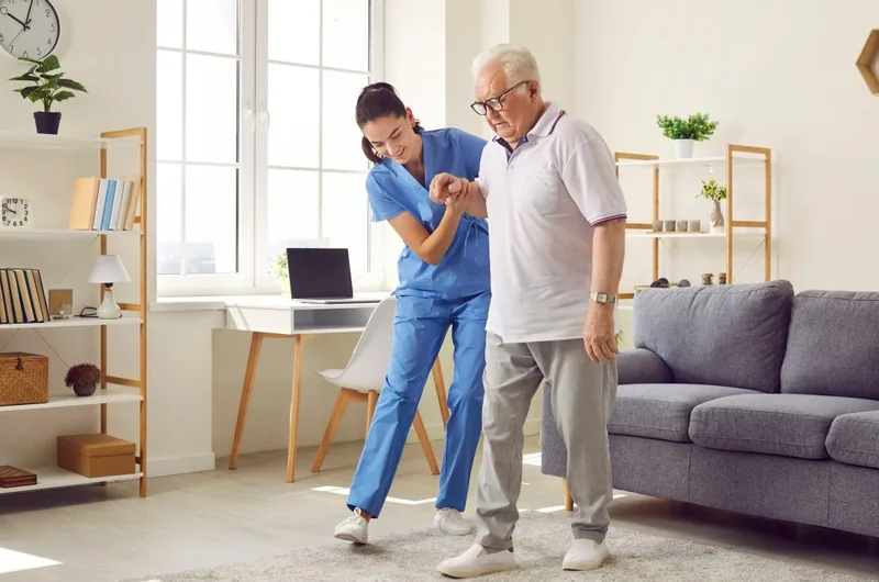 Caregiver assisting client with recovery