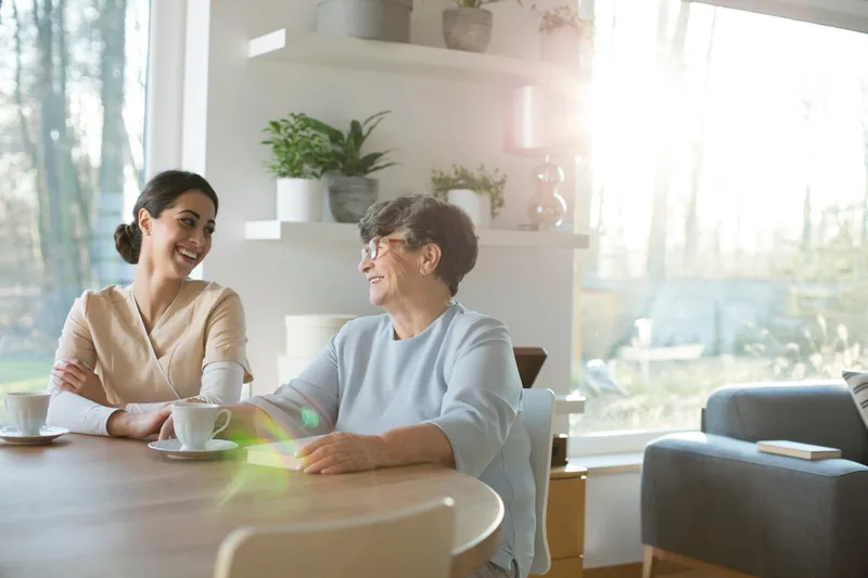 Caregiver spending quality time with a senior companion
