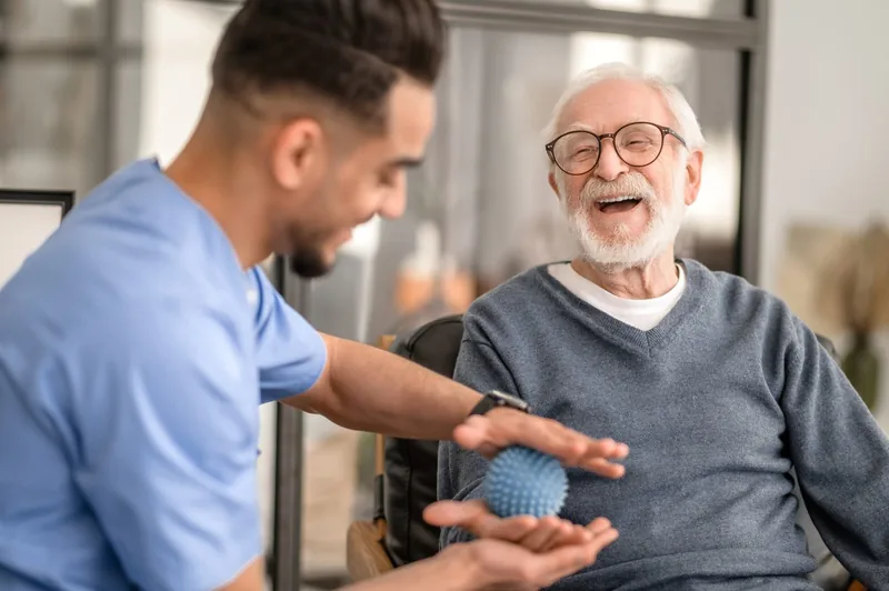 Caregiver helping a client transition from hospital to home