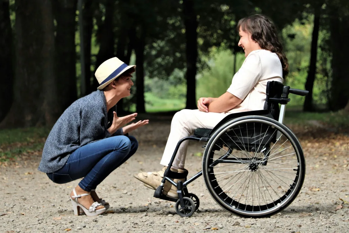 Senior client reviewing care plan with caregiver